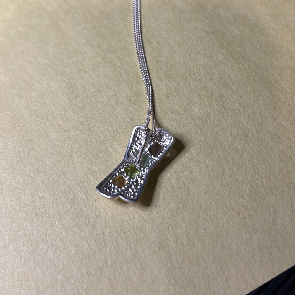 Sterling silver pendant necklace with purple, blue, green and yellow gems. - Picture 2 of 3